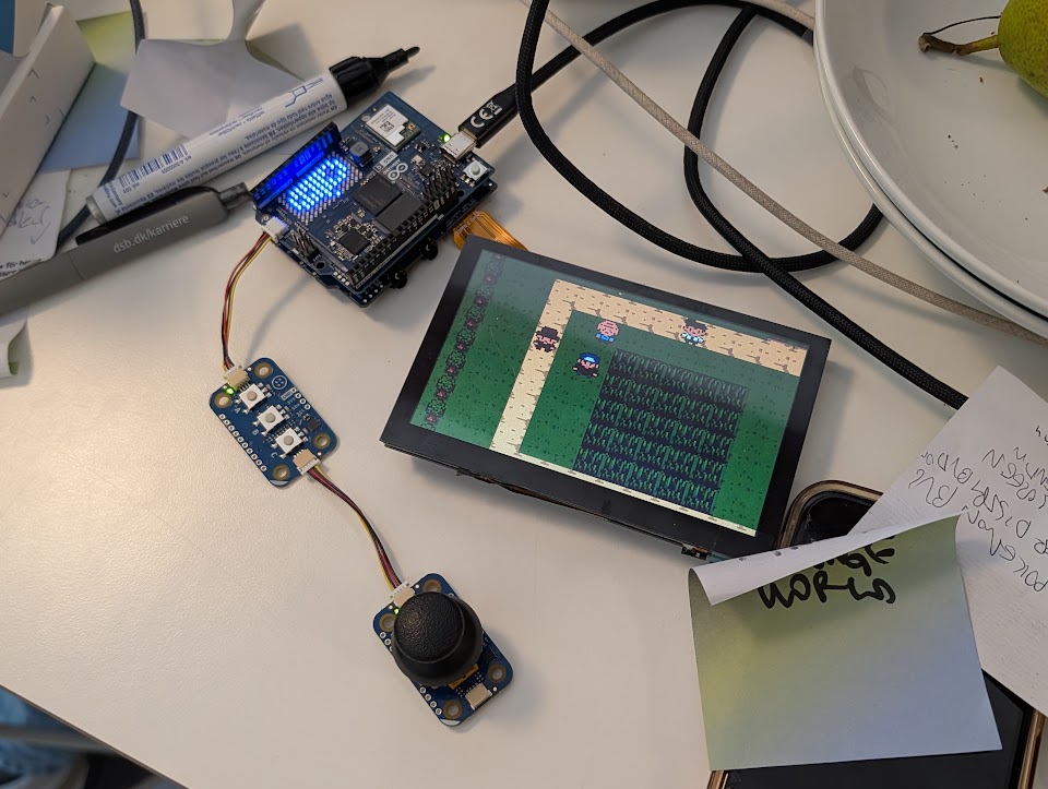 A working handheld: game, display, joystick and Arduino hardware.